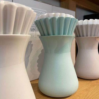 Coffee cups in white and green
